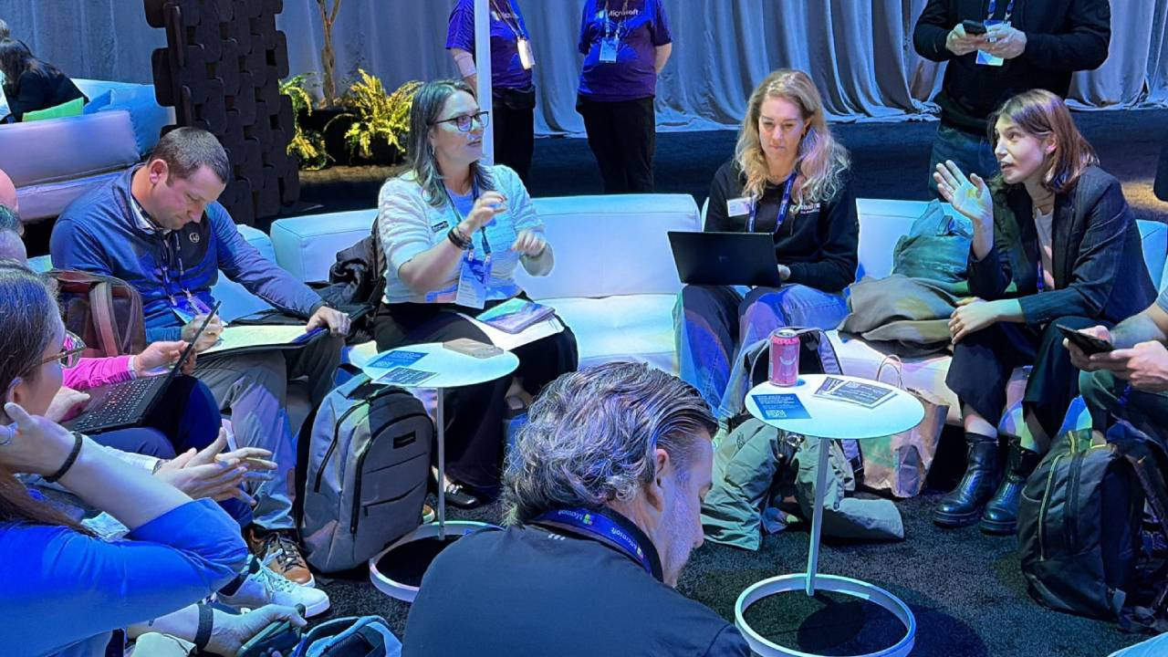 A culture built on curiosity and collaboration: teammates openly exchanging ideas to elevate each other and the partners