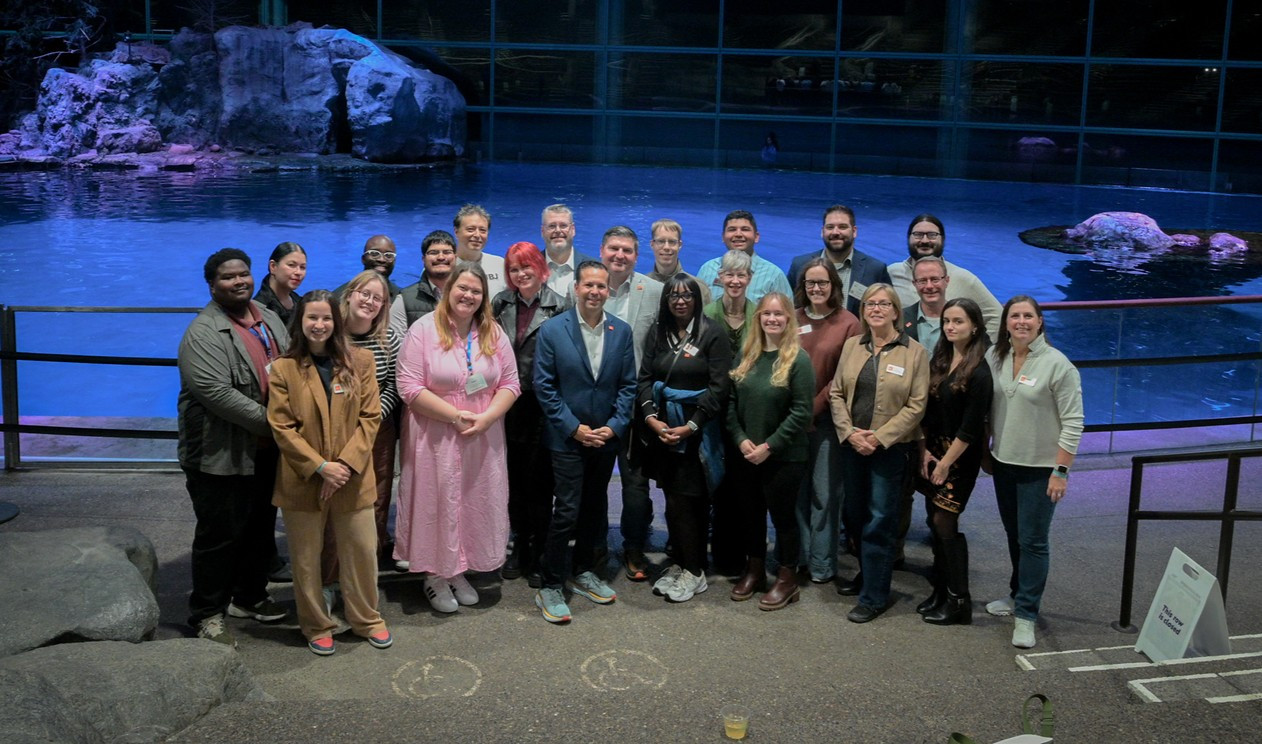Employees gather at Shedd Aquarium for Annual Meeting closing night, celebrating people and shared experiences