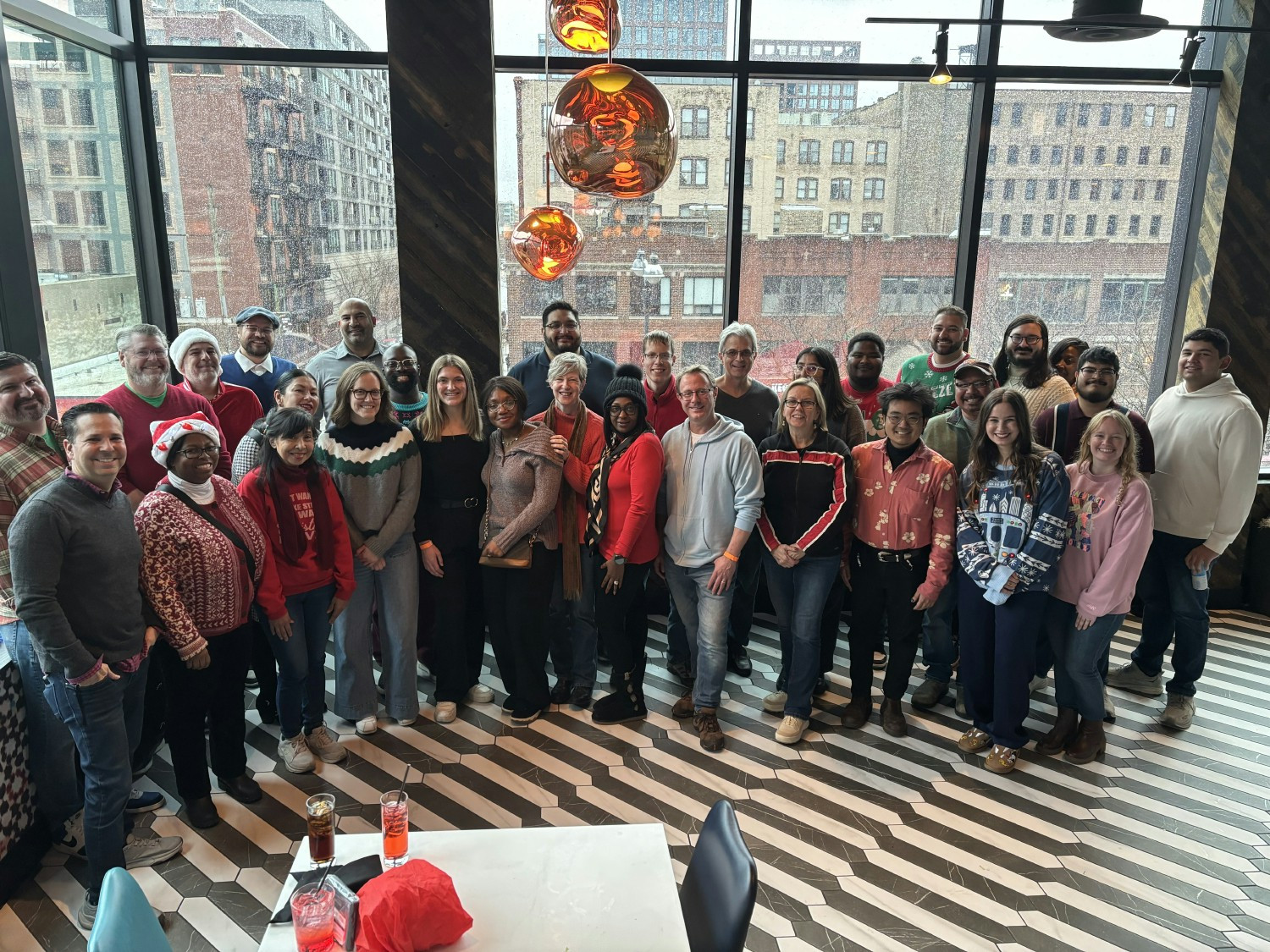 Employees gather at our annual winter outing, celebrating camaraderie and connection