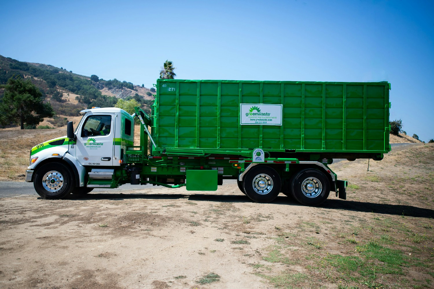 GreenWaste roll-off truck with debris box.