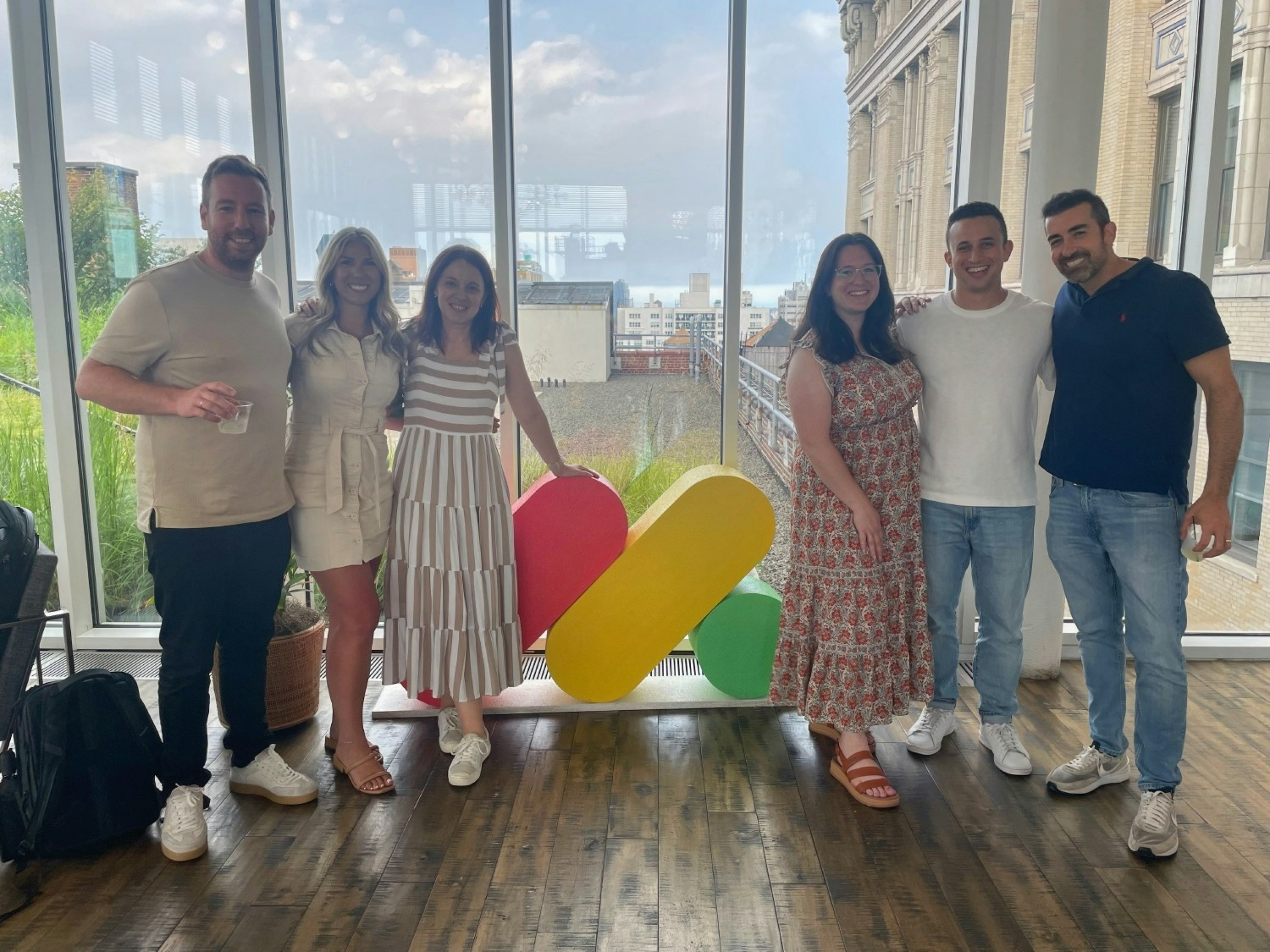 Julia, Jen, and Heather hosted a happy hour for the office at the monday.com headquarters.