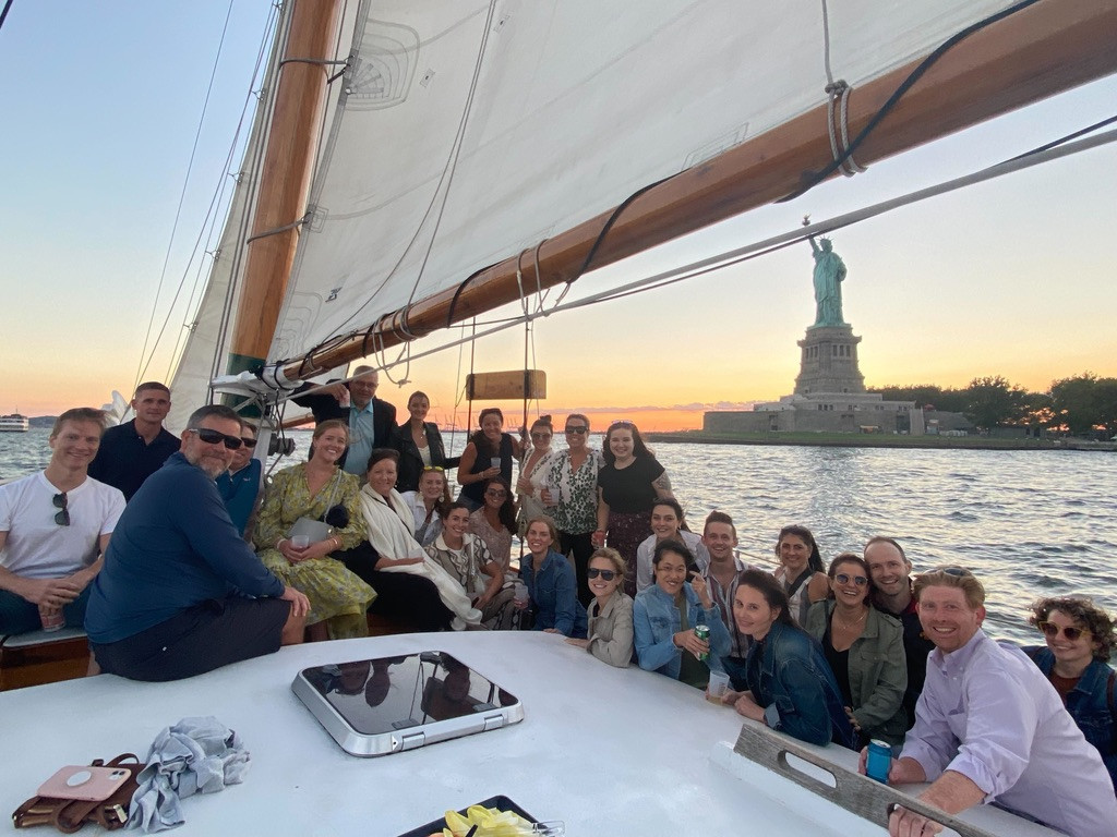 Team sailing outing on the Hudson River, catching a sunset view of the Statue of Liberty!