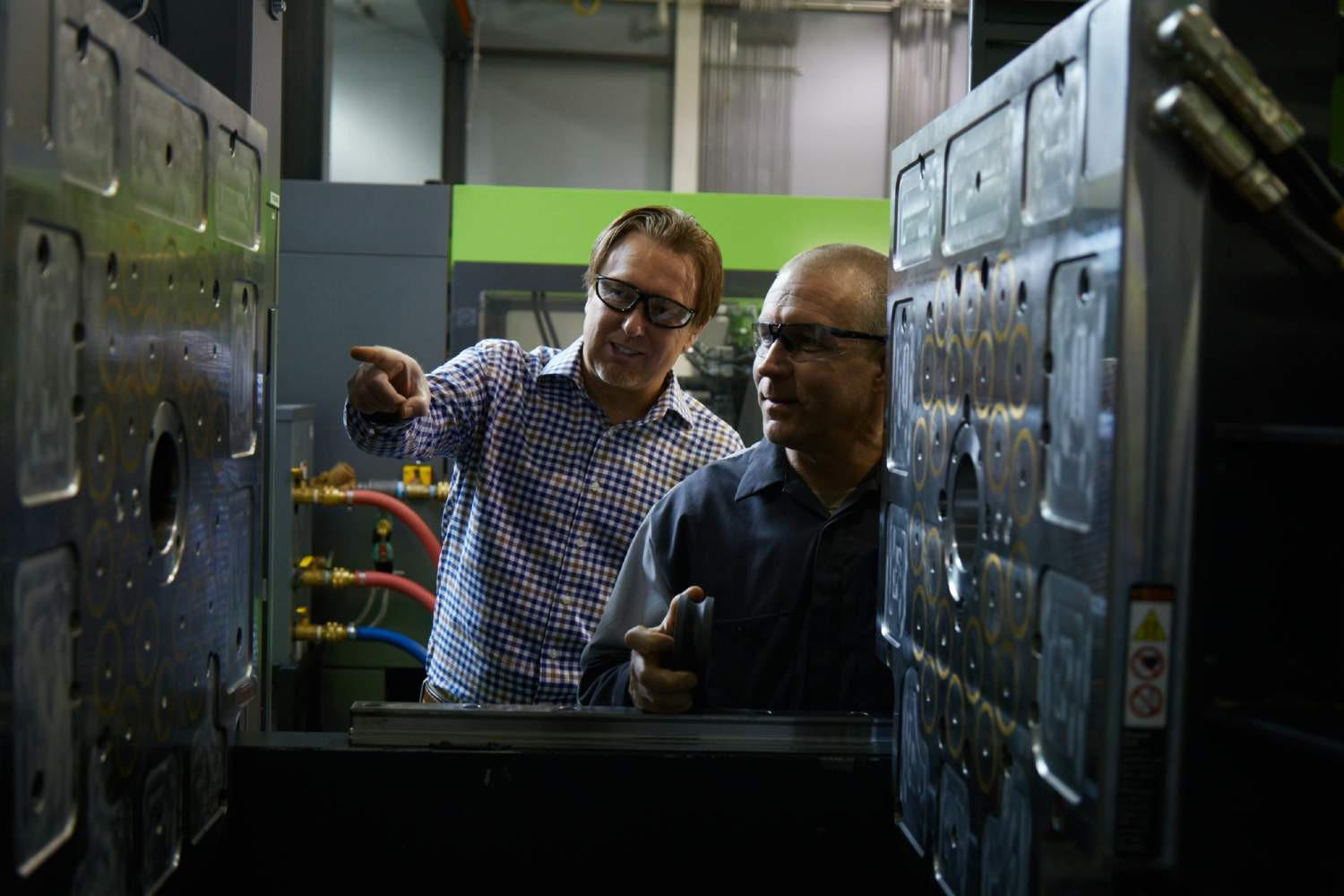 Hands-on collaboration at the machine — turning expertise and innovation into precision manufacturing solutions.