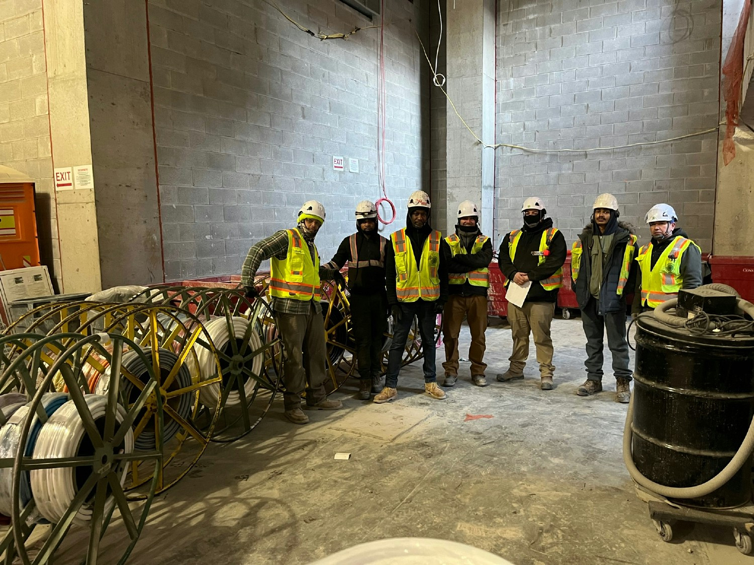 team getting ready for wire pull