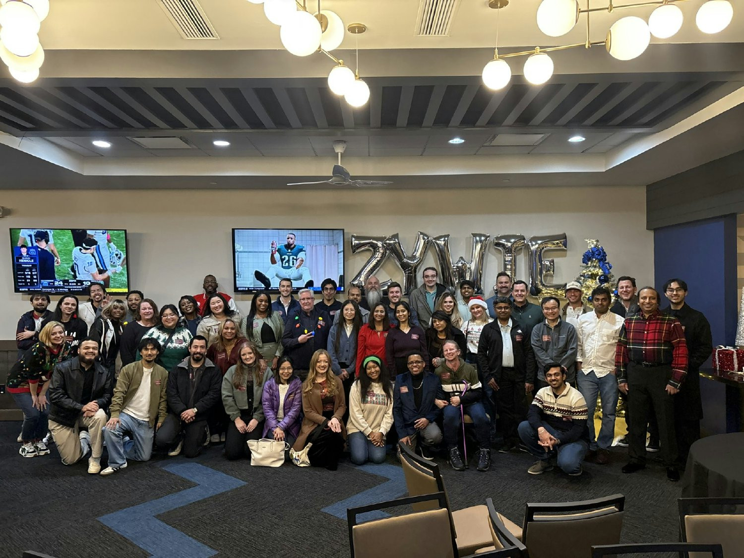 Showing team spirit at our Holiday Party!