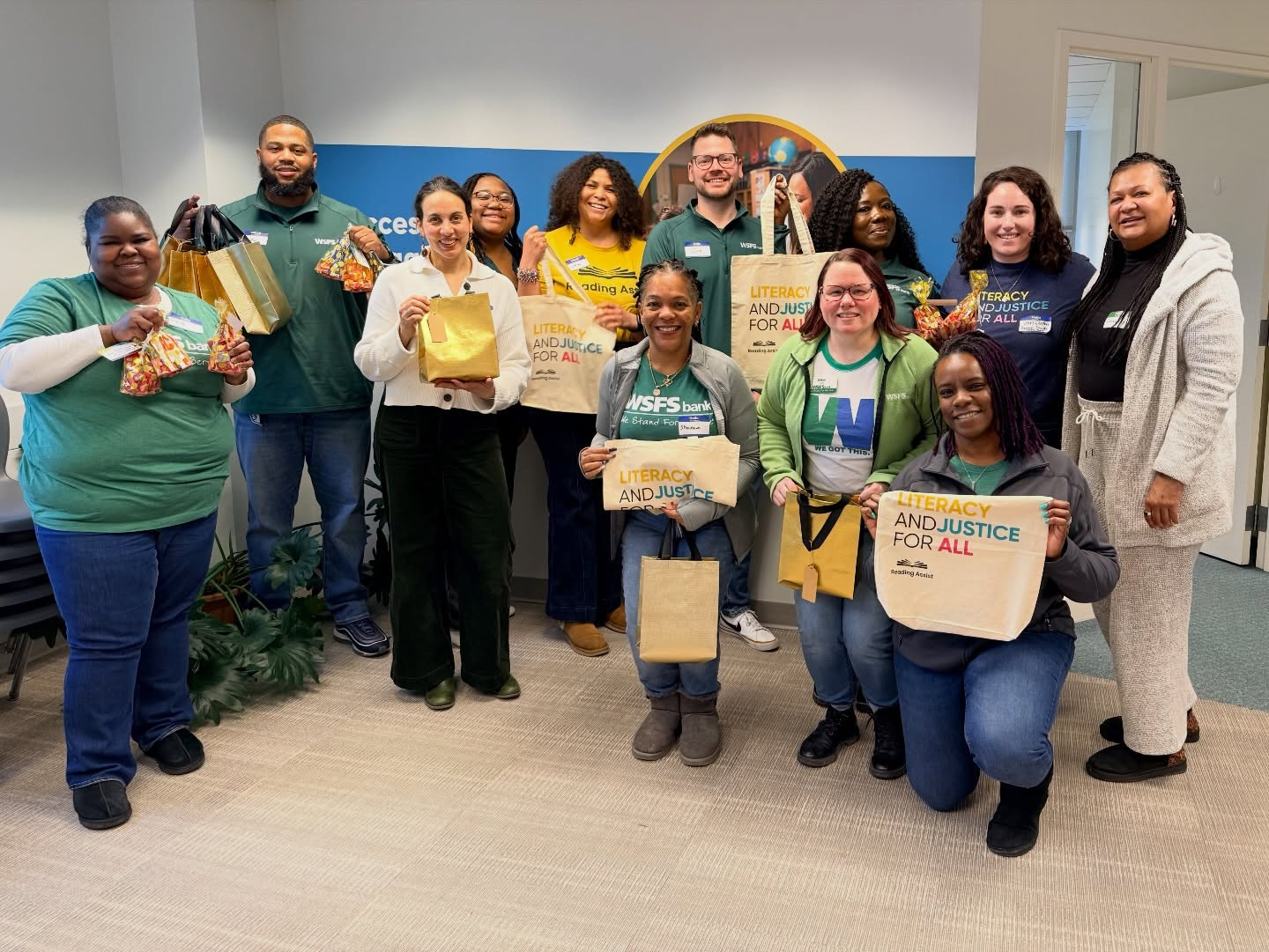 Reading Assist team with volunteers helping to prepare learning kits