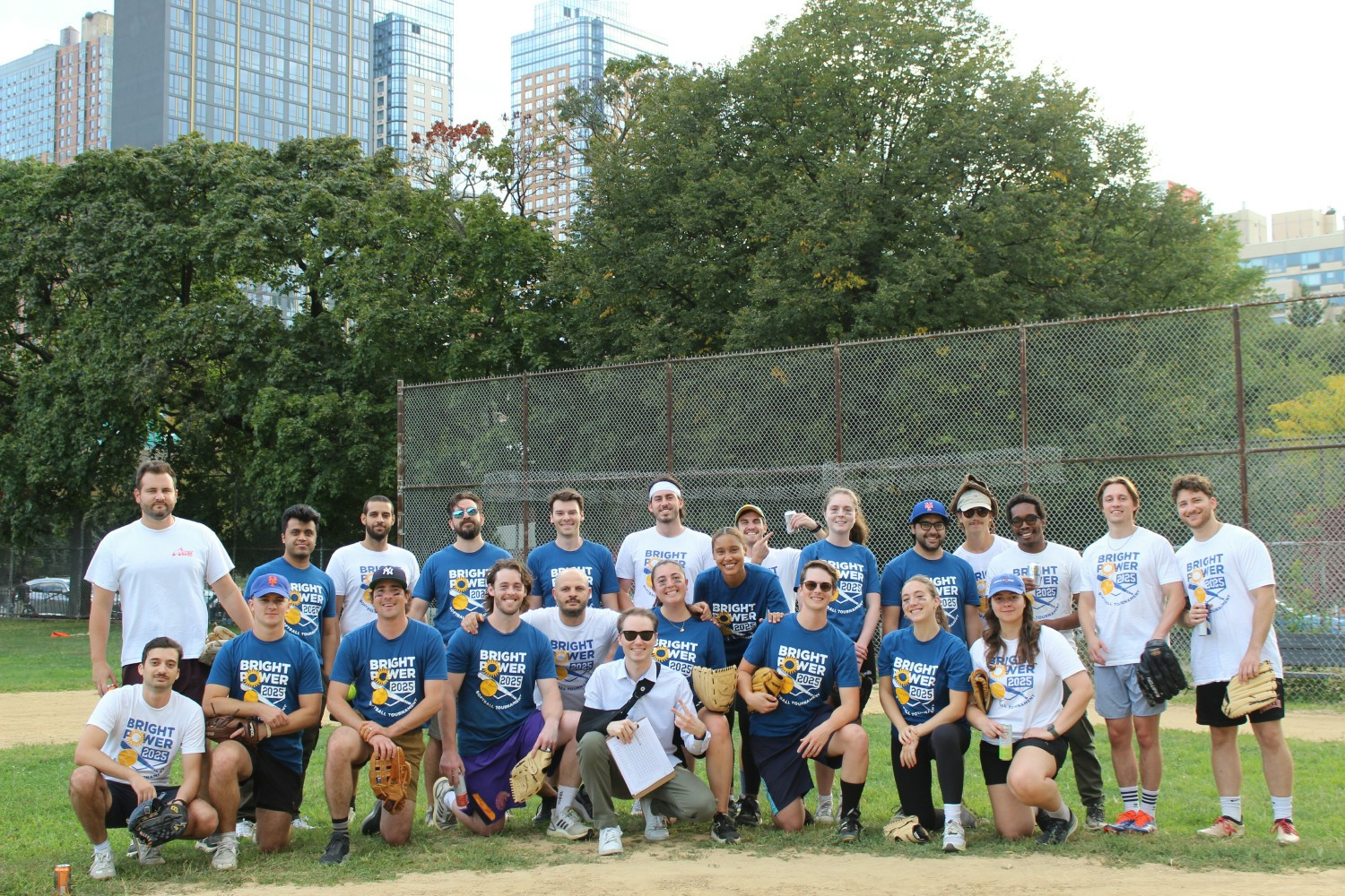 Bright Power team members at our annual softball league, fostering connection, collaboration, and community.

