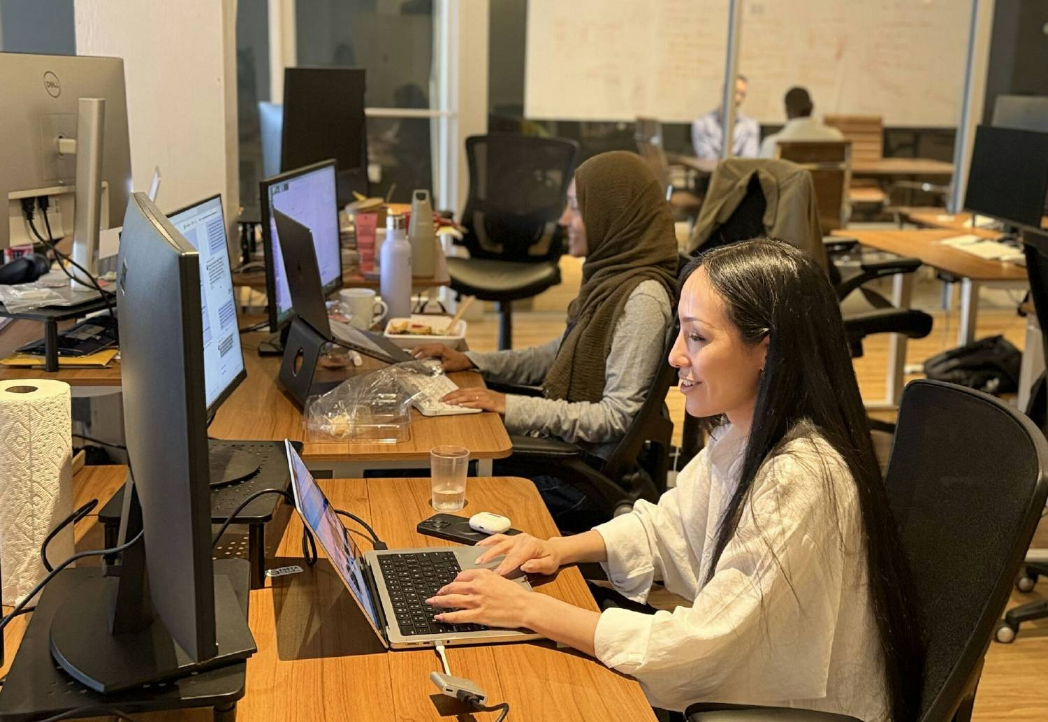 Two of our Software Engineers hard at work