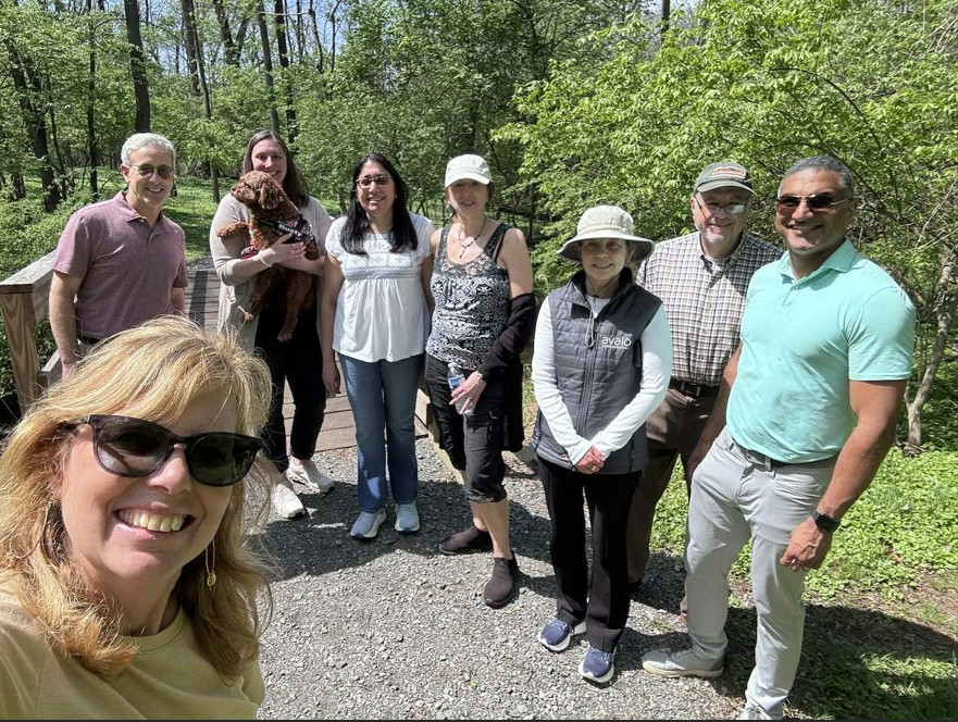 Stepping away from our desks to take a team walk on the trail