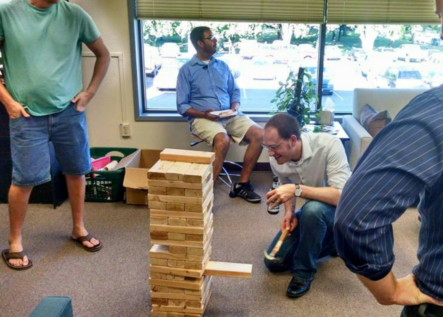 Early days at Gravis Law. CEO Brett Spooner playing Jenga.