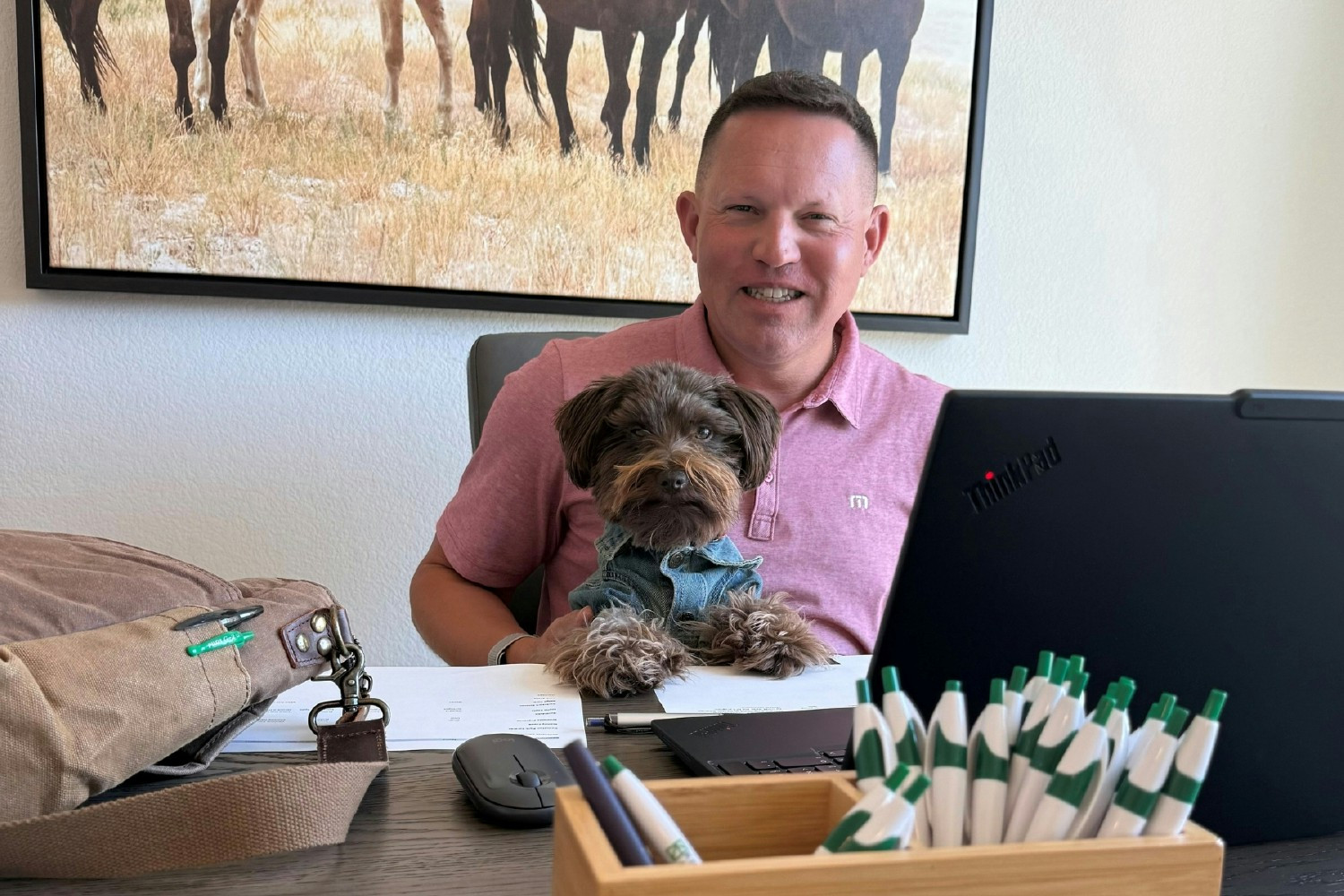 Our Sales Director, Roger, and Tank, our paw-some assistant, bring energy and heart to the team.