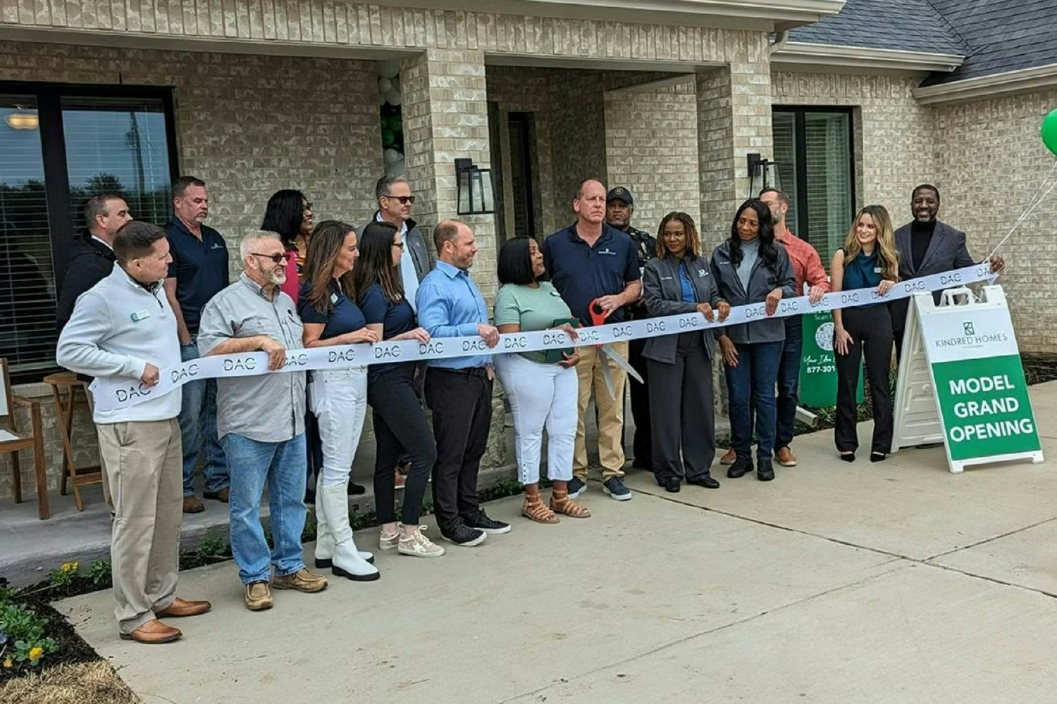 A ribbon cutting celebration marking growth, progress, and the bright future ahead.
