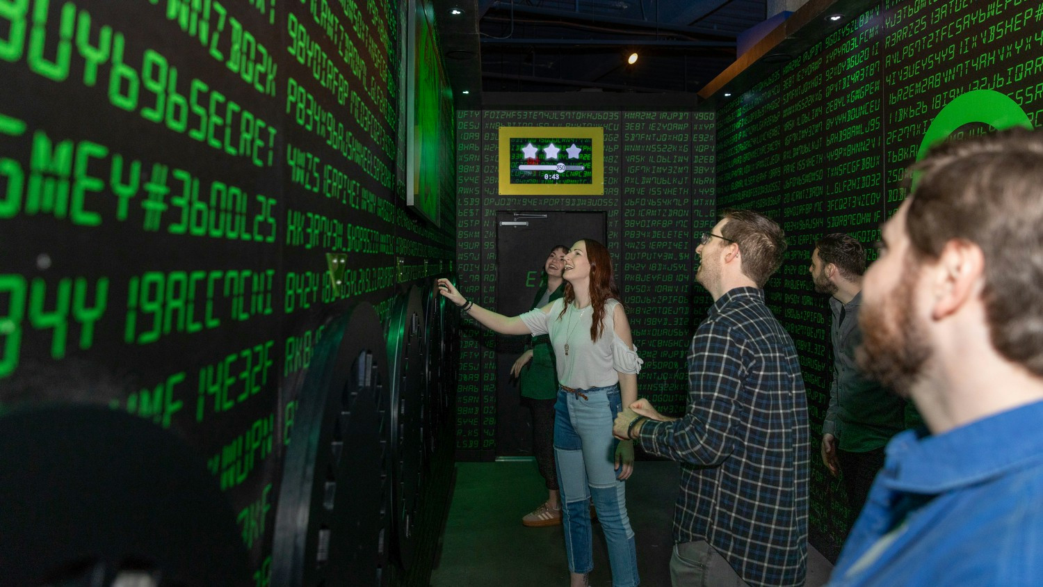 A group of Level99 team members playing one of our Challenge Rooms together! (And helping create social media content!)