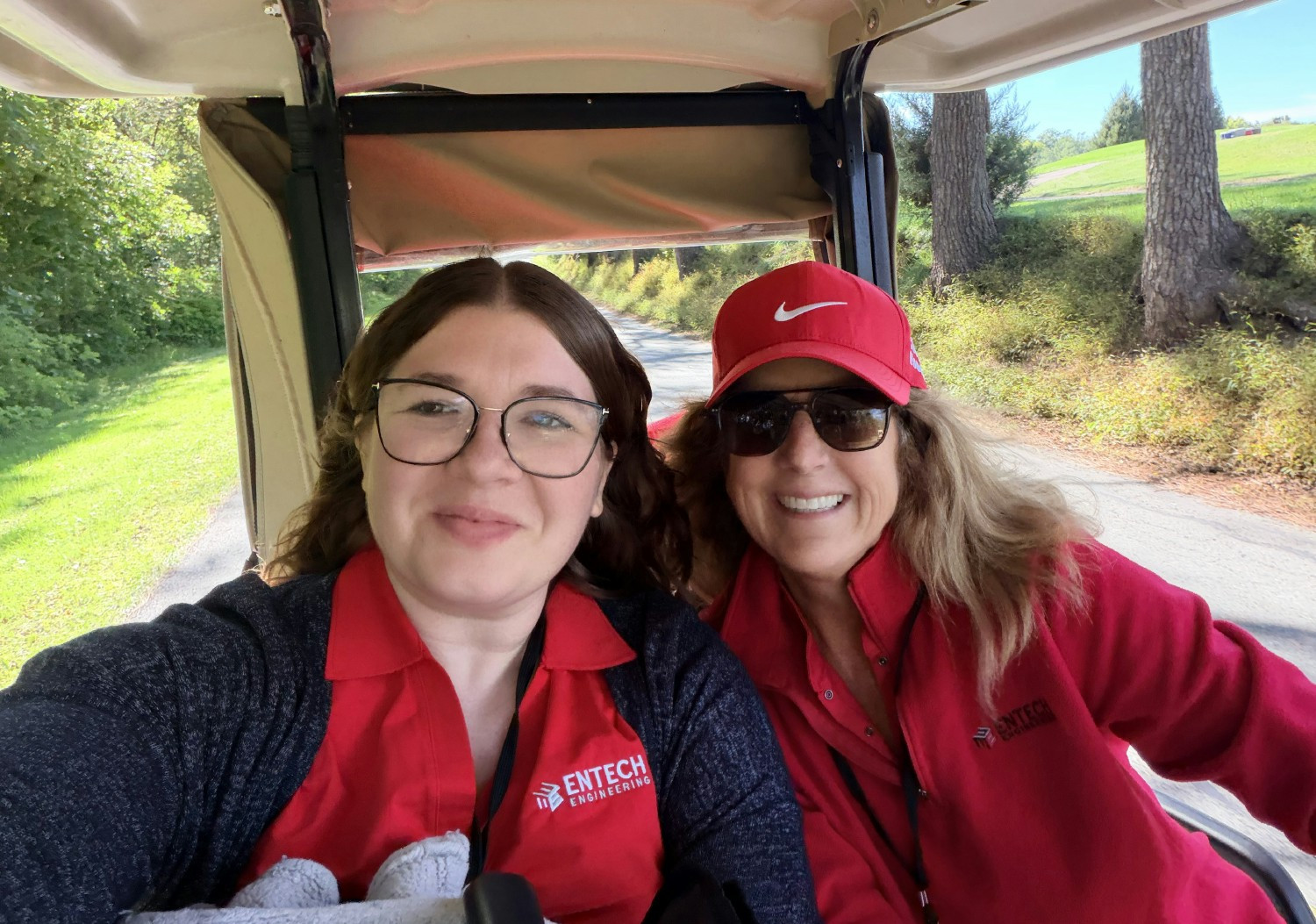 Hard at work on the golf course, entertaining clients and looking for lost golf balls!