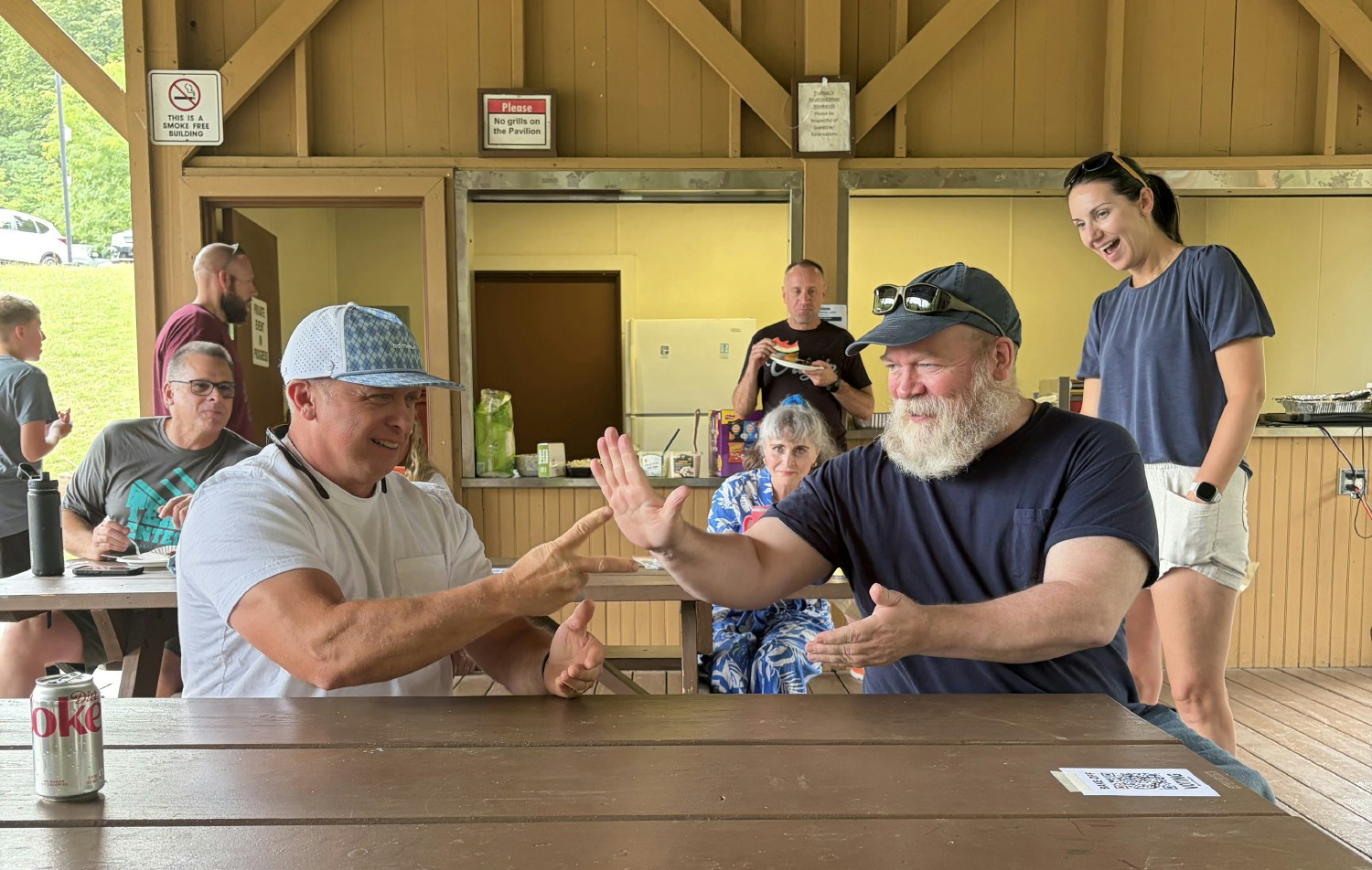 The championship moment from our summer picnic’s inaugural rock, paper, scissors tournament! Scissors beats paper!