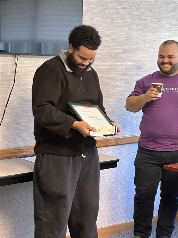 Our Employee of the Month, Angel Cruz, receiving his recognition.