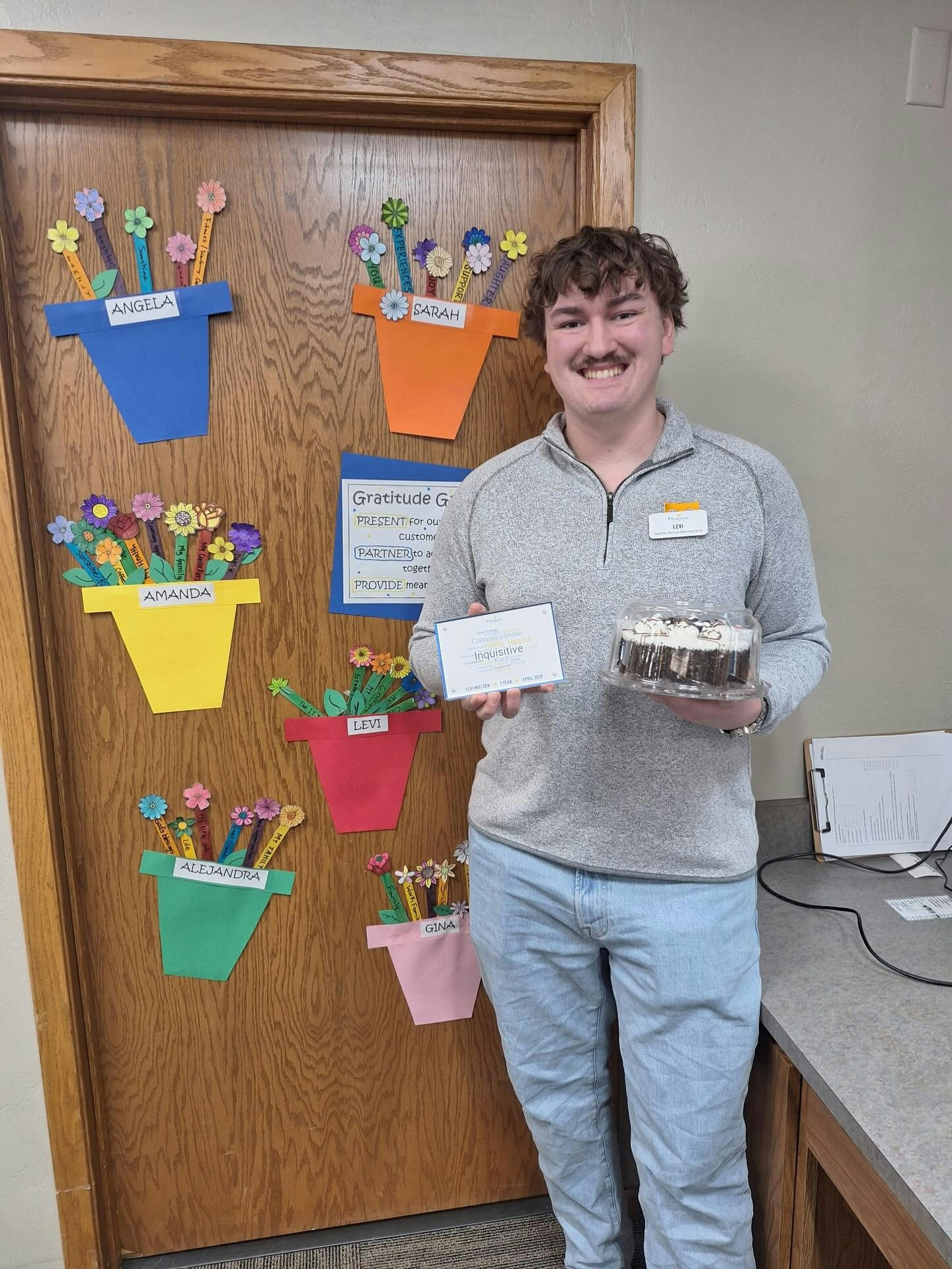 Team member celebrating their 1-year anniversary with Prospera Credit Union!