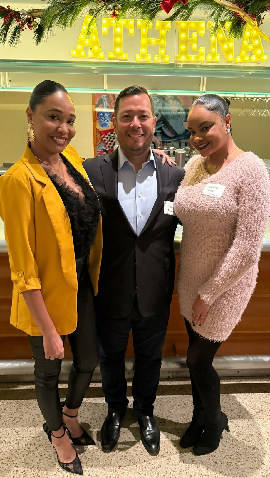 Our CEO alongside some of our wonderful managers!