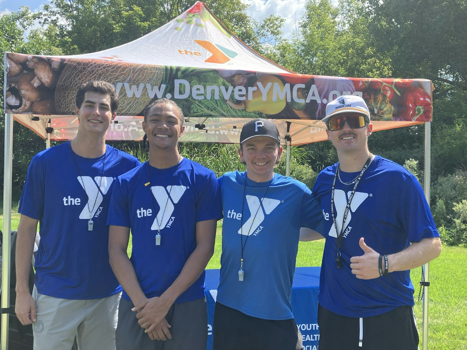 Youth Sports & Membership staff guide young athletes at our NFL Football Clinic at the Southwest YMCA.