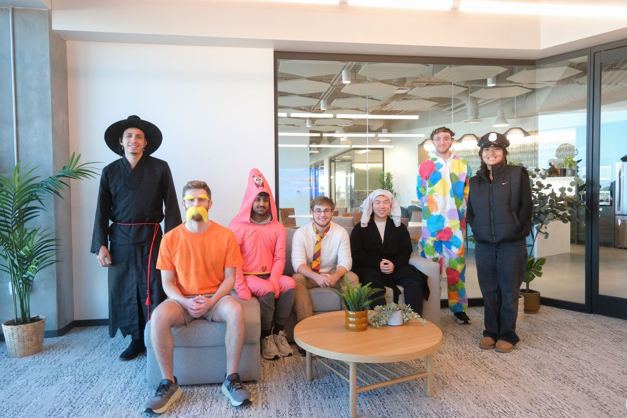 Sola employees taking part in a fun costume-themed team event that highlights our playful, creative, and connected cultu