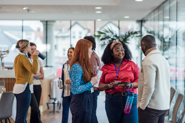 Employees gathering at an all-hands meeting.