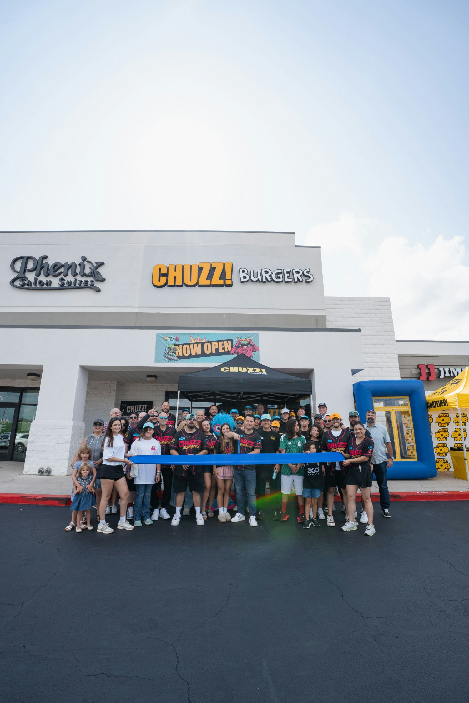 Chuzz ribbon cutting before customers arrive. 