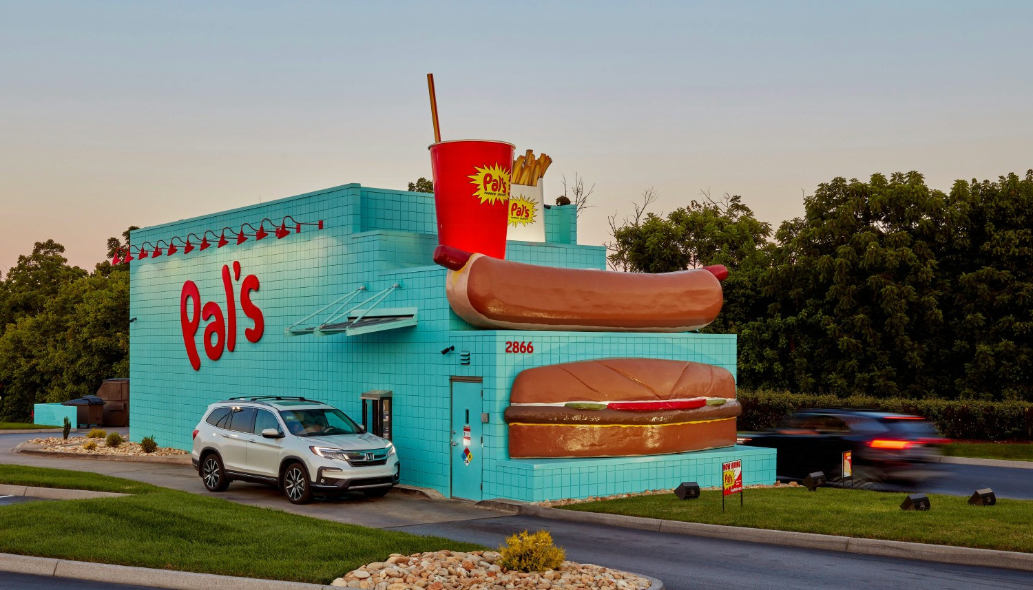 Pal's Sudden Service iconic drive thru design featuring 20' Hamburger and 23' Hotdog, ran by our extraordinary teams.