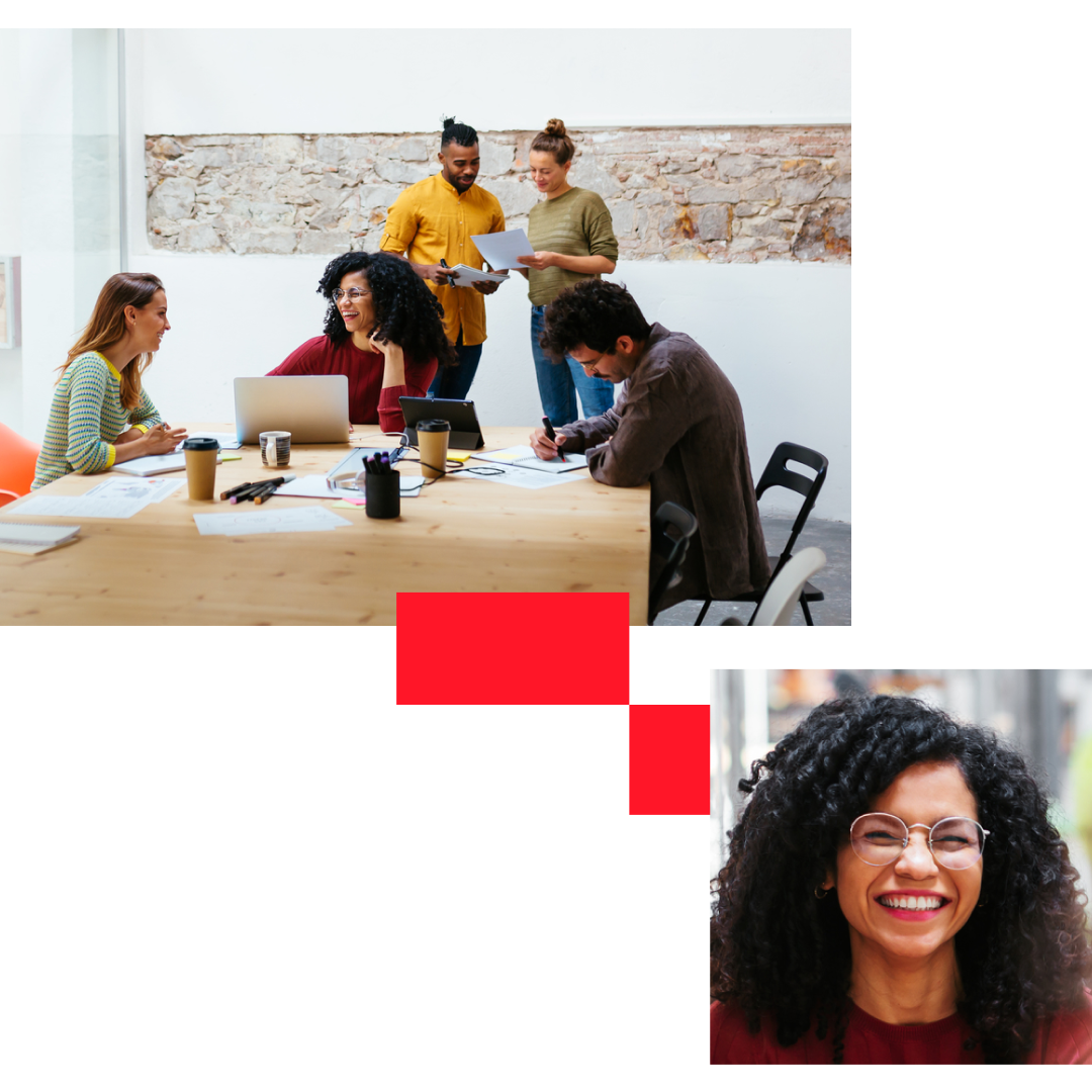 A diverse group of professionals engaged in a productive meeting, discussing ideas and collaborating in a well-lit meeting room. 