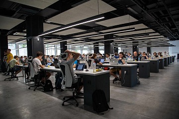 Full office with tech workers